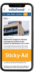 Ein Smartphone mit der Ansicht des Werbemittels "Sticky Ad" in der News-App des Trierischen Volksfreund wird dargestellt.