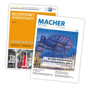 Die Titelseiten zweier lokaler Wirtschaftsmagazine des Trierischen Volksfreund werden dargestellt.