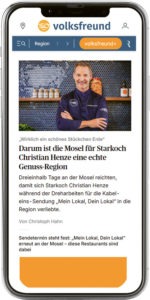 Ein Smartphone mit der Ansicht des Werbemittels "Sticky Ad" in der News-App des Trierischen Volksfreund wird dargestellt.