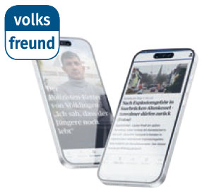 Ein Smartphone mit der Volksfreund-News-App wird dargestellt.